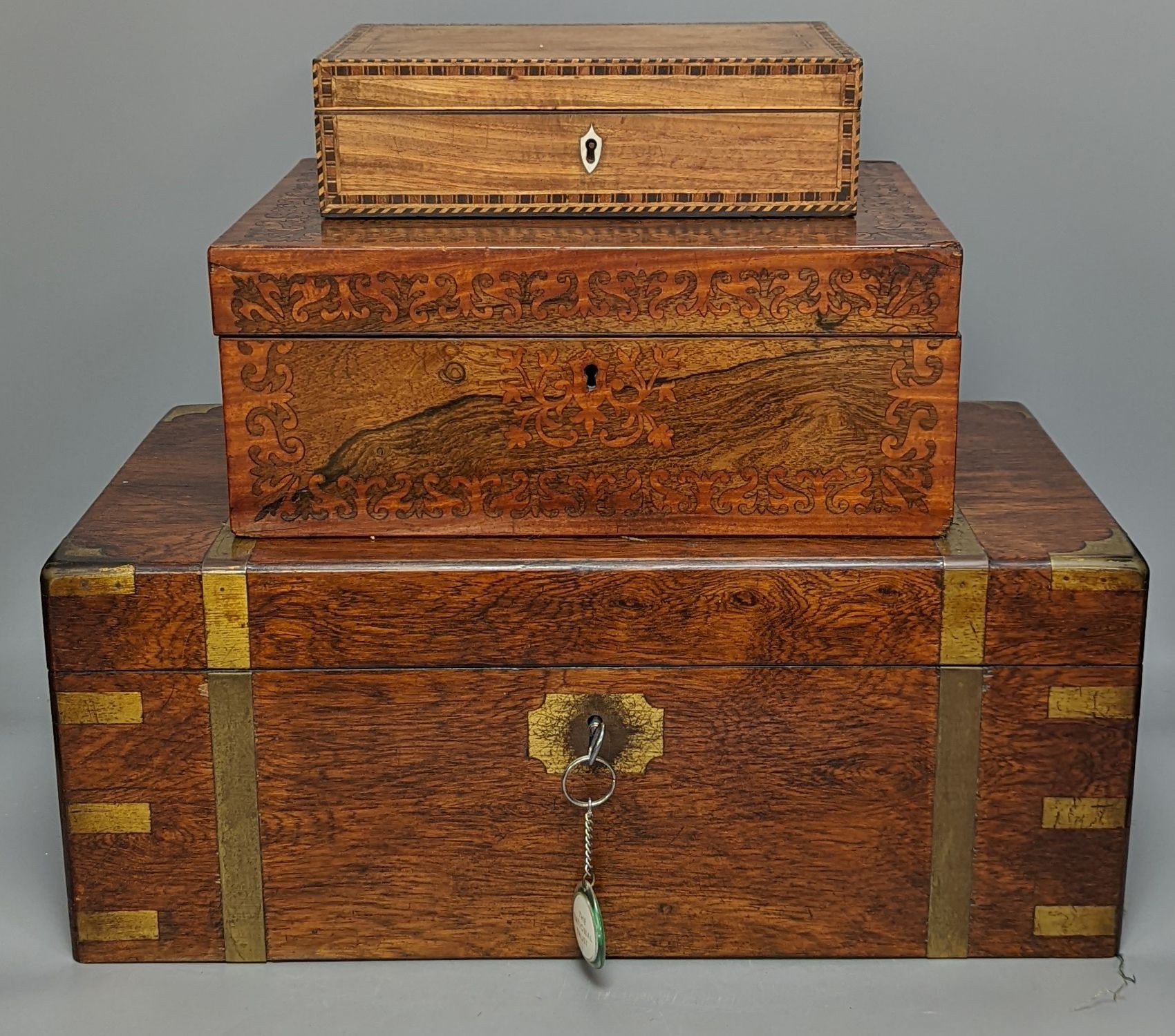 A Victorian rosewood writing slope and two other 19th century boxes, Writing slope 45cm x 18cm